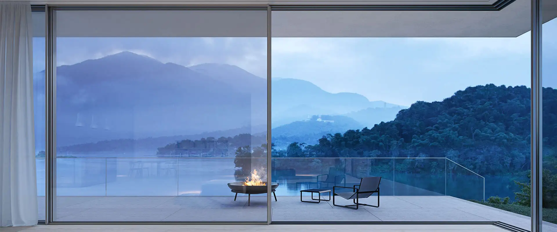 Vue sur un lac à travers un grand coulissant minimaliste cero