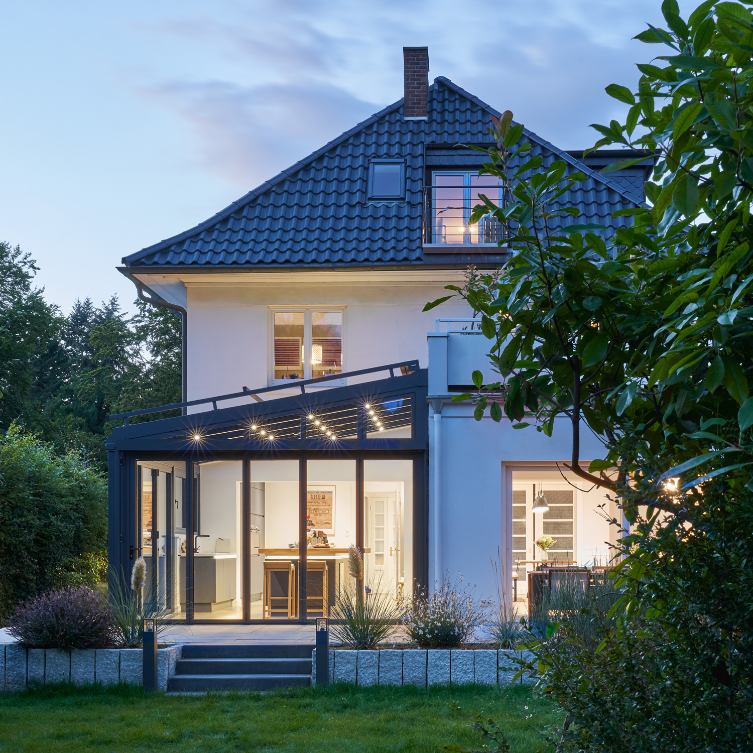 Elegant vinterhage i aluminium med glasstak