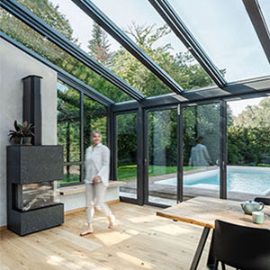 Solarlux serre met glazen vouwwanden zorgen voor een extra ruimte met veel zonlicht