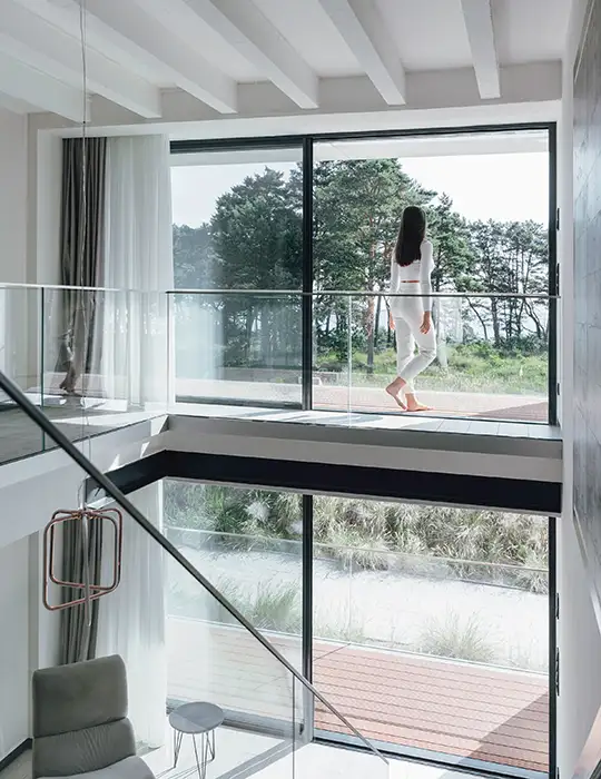 Grandes fenêtres coulissantes avec vue sur la mer Baltique Appartements de vacances Rügen