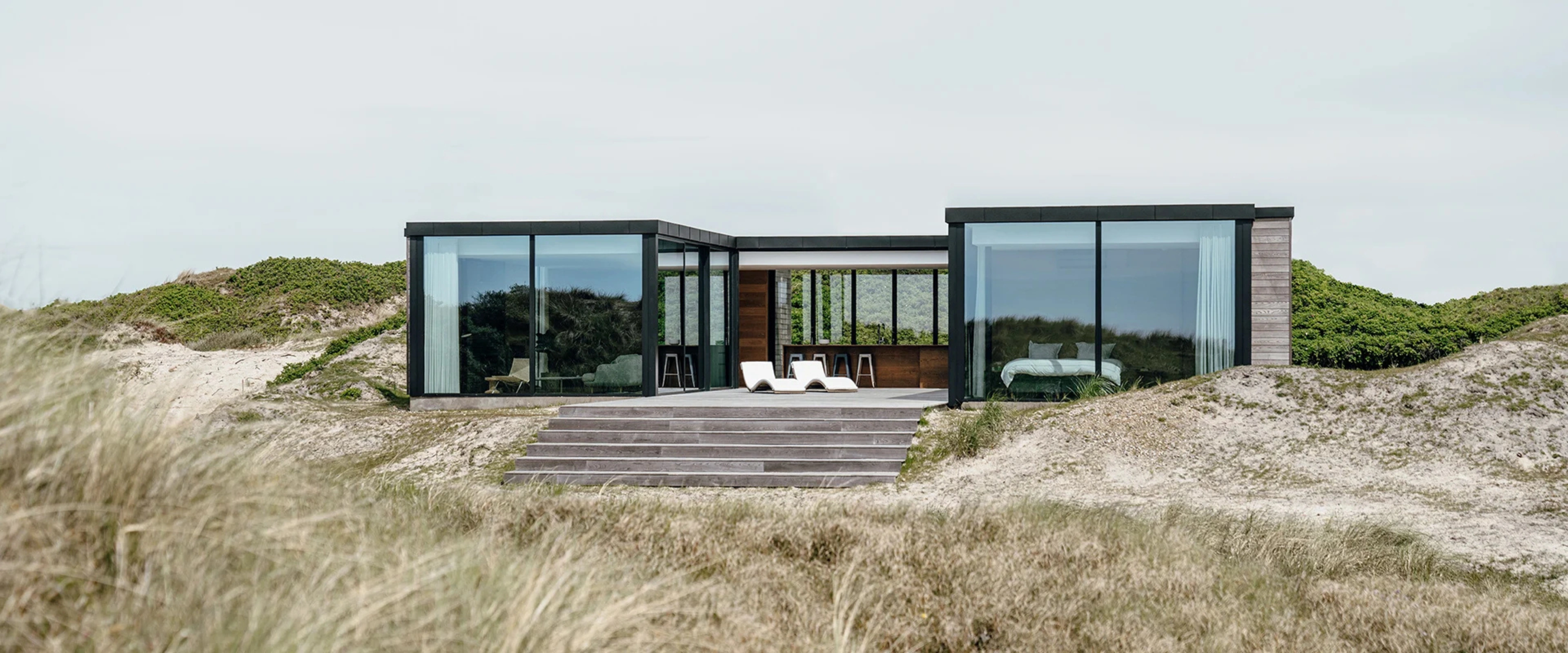 Modernt fritidshus med skjutdörr cero och vikdörr highline